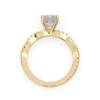 Emerald brilliant lab grown diamond engagement ring with prong setting and twisted pavé diamond band in yellow gold tone