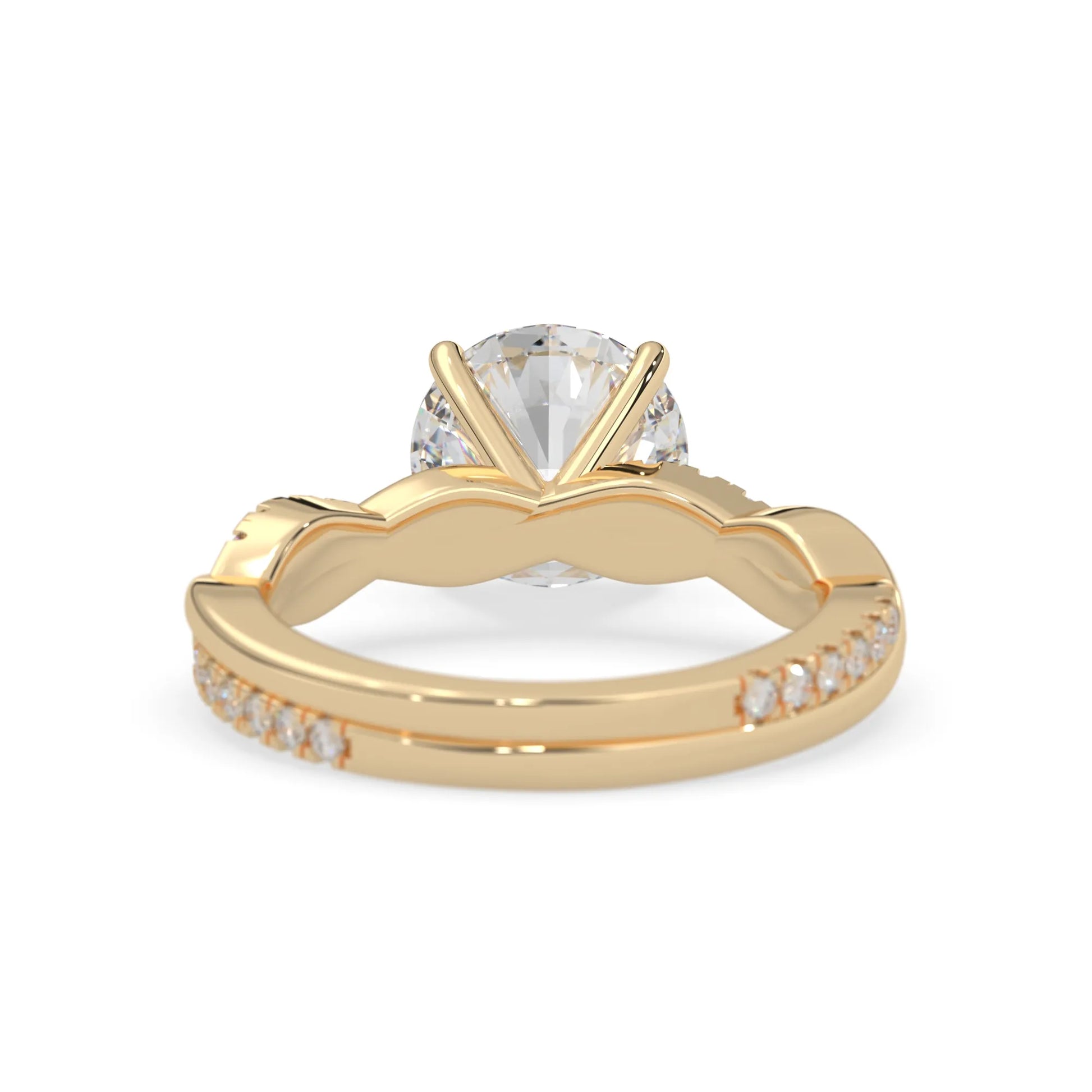 Round brilliant lab grown diamond engagement ring with prong setting and twisted pavé diamond band in yellow gold tone