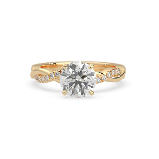 Round brilliant lab grown diamond engagement ring with prong setting and twisted pavé diamond band in yellow gold tone