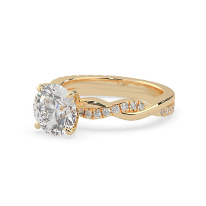 Round brilliant lab grown diamond engagement ring with prong setting and twisted pavé diamond band in yellow gold tone