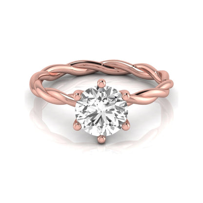 Round cut lab grown diamond engagement ring featuring a 1.28 carat center diamond in a six-prong solitaire setting with an elegant twisted rope band and polished rose gold finish.