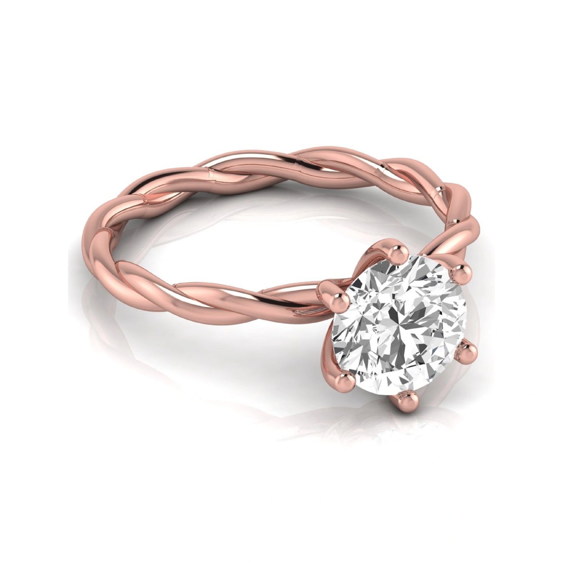 Round cut lab grown diamond engagement ring featuring a 1.28 carat center diamond in a six-prong solitaire setting with an elegant twisted rope band and polished rose gold finish.