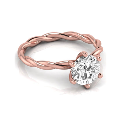 Round cut lab grown diamond engagement ring featuring a 1.28 carat center diamond in a six-prong solitaire setting with an elegant twisted rope band and polished rose gold finish.