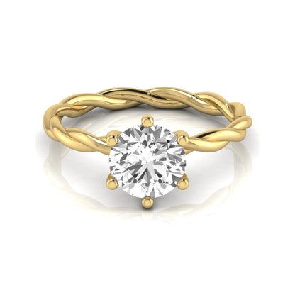 Round cut lab grown diamond engagement ring featuring a 1.28 carat center diamond in a six-prong solitaire setting with an elegant twisted rope band and polished yellow gold finish.