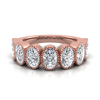 Seven Stone Oval Cut Lab Grown Diamond Band Ring featuring seven oval cut diamonds in elegant milgrain bezel-inspired settings with a rose gold tone band.