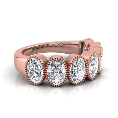 Seven Stone Oval Cut Lab Grown Diamond Band Ring featuring seven oval cut diamonds in elegant milgrain bezel-inspired settings with a rose gold tone band.