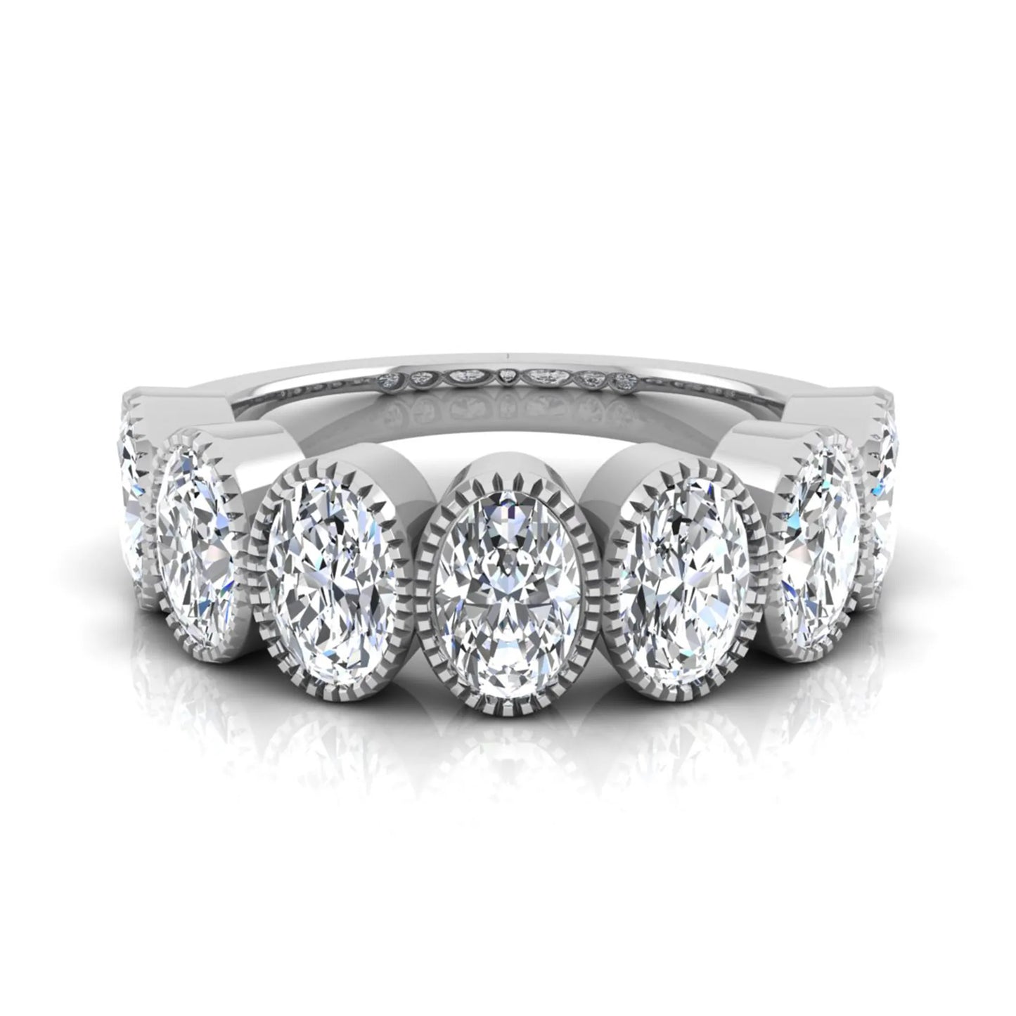 Seven Stone Oval Cut Lab Grown Diamond Band Ring featuring seven oval cut diamonds in elegant milgrain bezel-inspired settings with a white gold tone band.