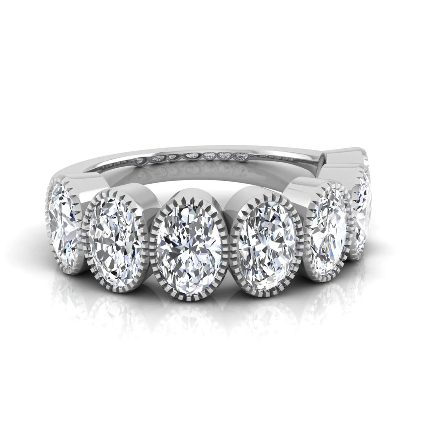 Seven Stone Oval Cut Lab Grown Diamond Band Ring featuring seven oval cut diamonds in elegant milgrain bezel-inspired settings with a white gold tone band.