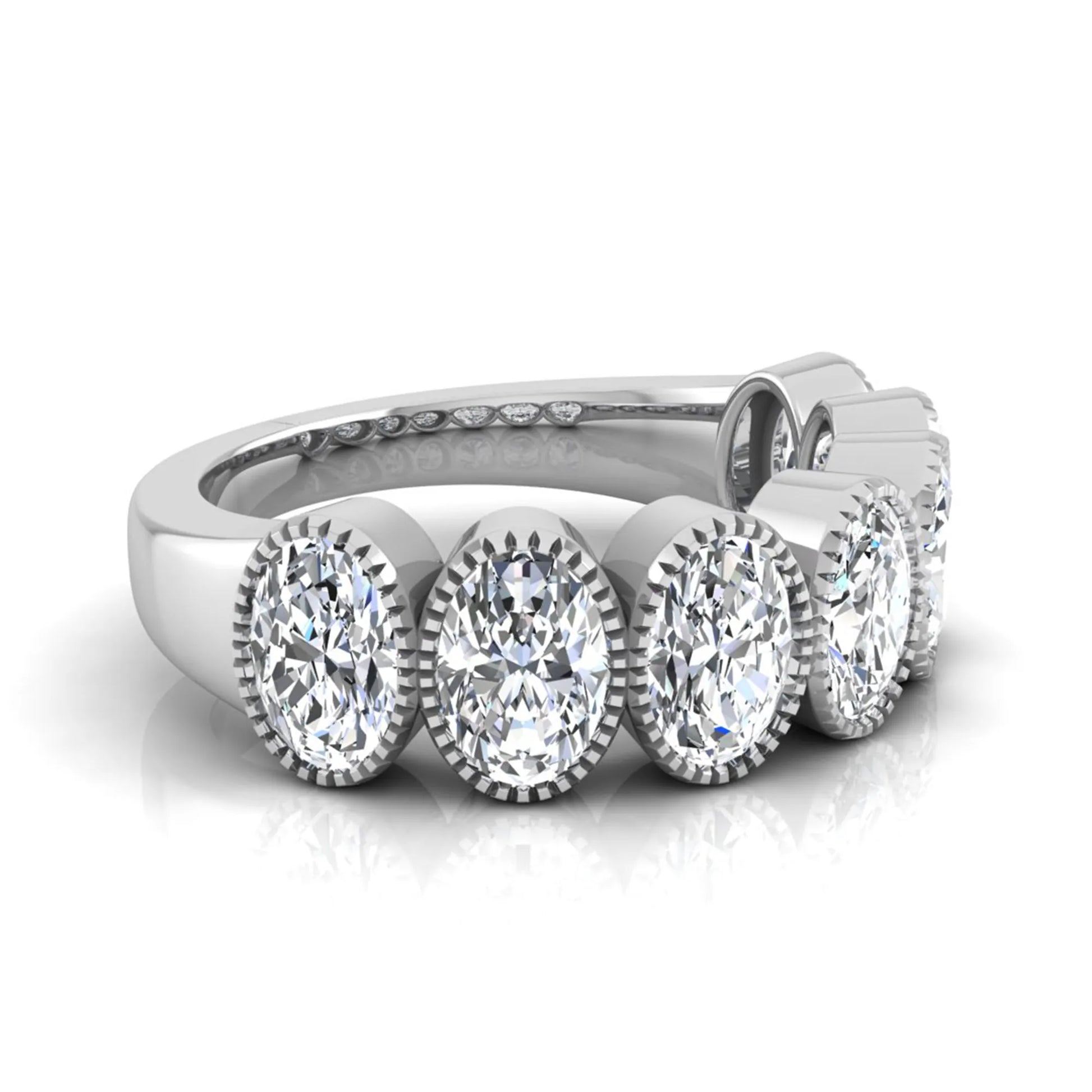 Seven Stone Oval Cut Lab Grown Diamond Band Ring featuring seven oval cut diamonds in elegant milgrain bezel-inspired settings with a white gold tone band.