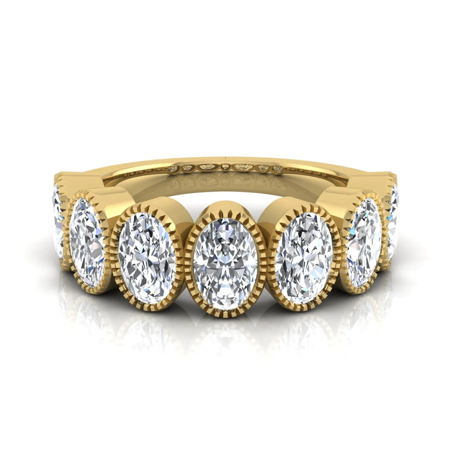Seven Stone Oval Cut Lab Grown Diamond Band Ring featuring seven oval cut diamonds in elegant milgrain bezel-inspired settings with a yellow gold tone band.