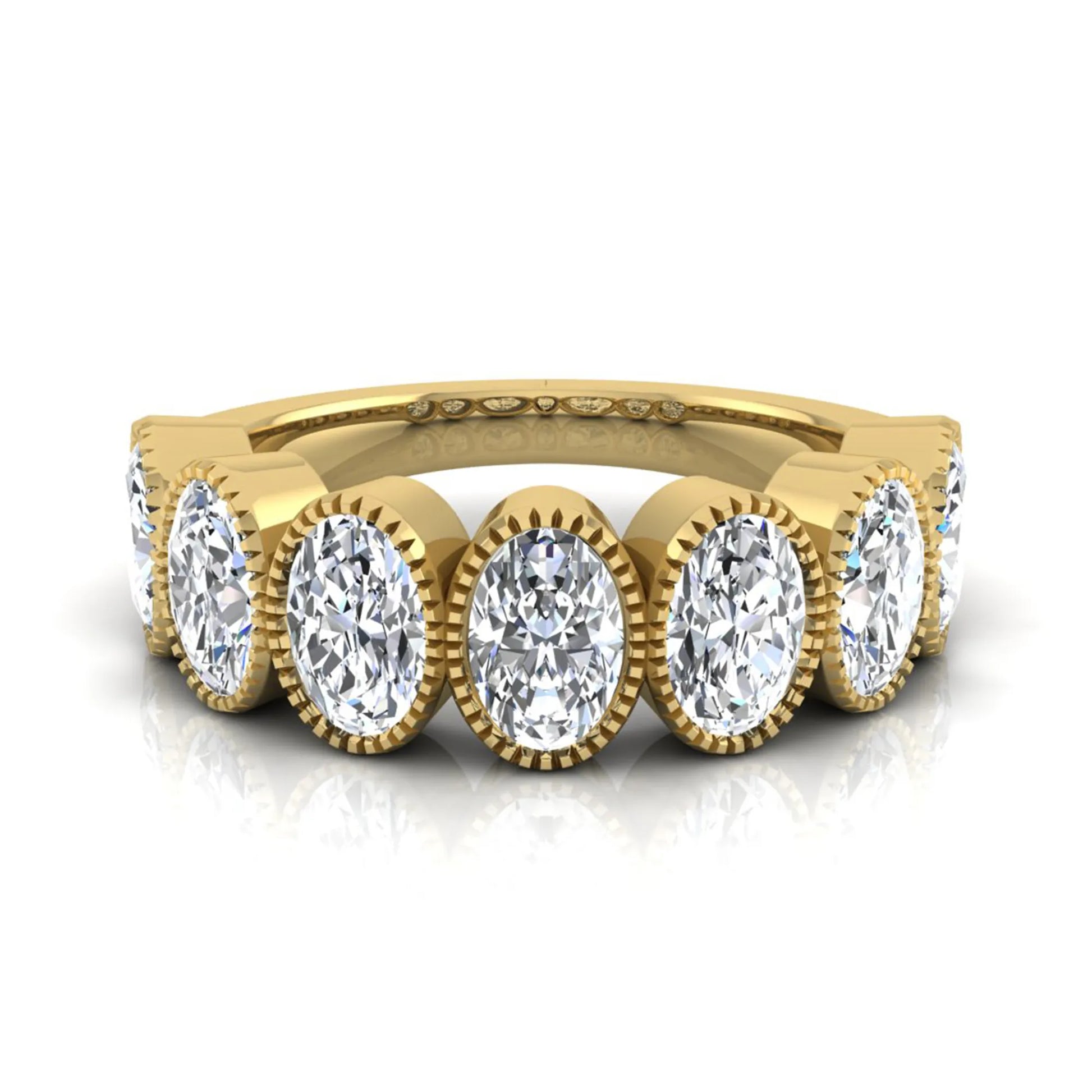 Seven Stone Oval Cut Lab Grown Diamond Band Ring featuring seven oval cut diamonds in elegant milgrain bezel-inspired settings with a yellow gold tone band.