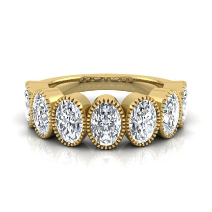 Seven Stone Oval Cut Lab Grown Diamond Band Ring featuring seven oval cut diamonds in elegant milgrain bezel-inspired settings with a yellow gold tone band.