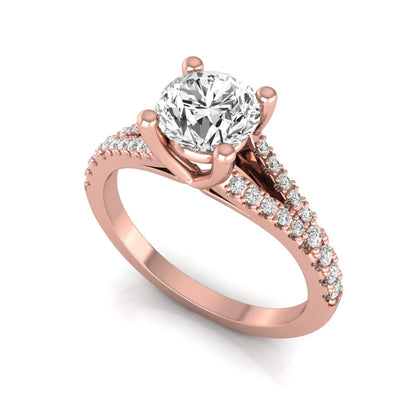 Rose-gold ring with a large diamond and smaller diamonds on the band against a white background