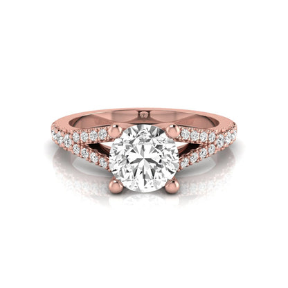 Rose-gold ring with a large diamond and smaller diamonds on the band against a white background