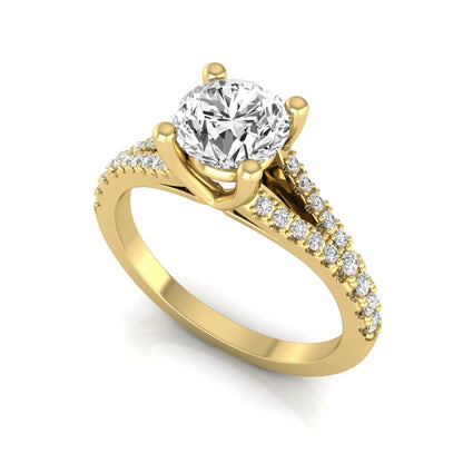 yellow-Gold ring with a large diamond and smaller diamonds on the band against a white background