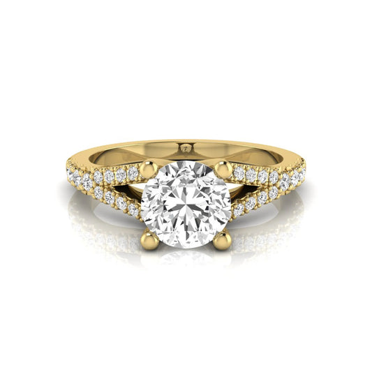yellow-Gold ring with a large diamond and smaller diamonds on the band against a white background