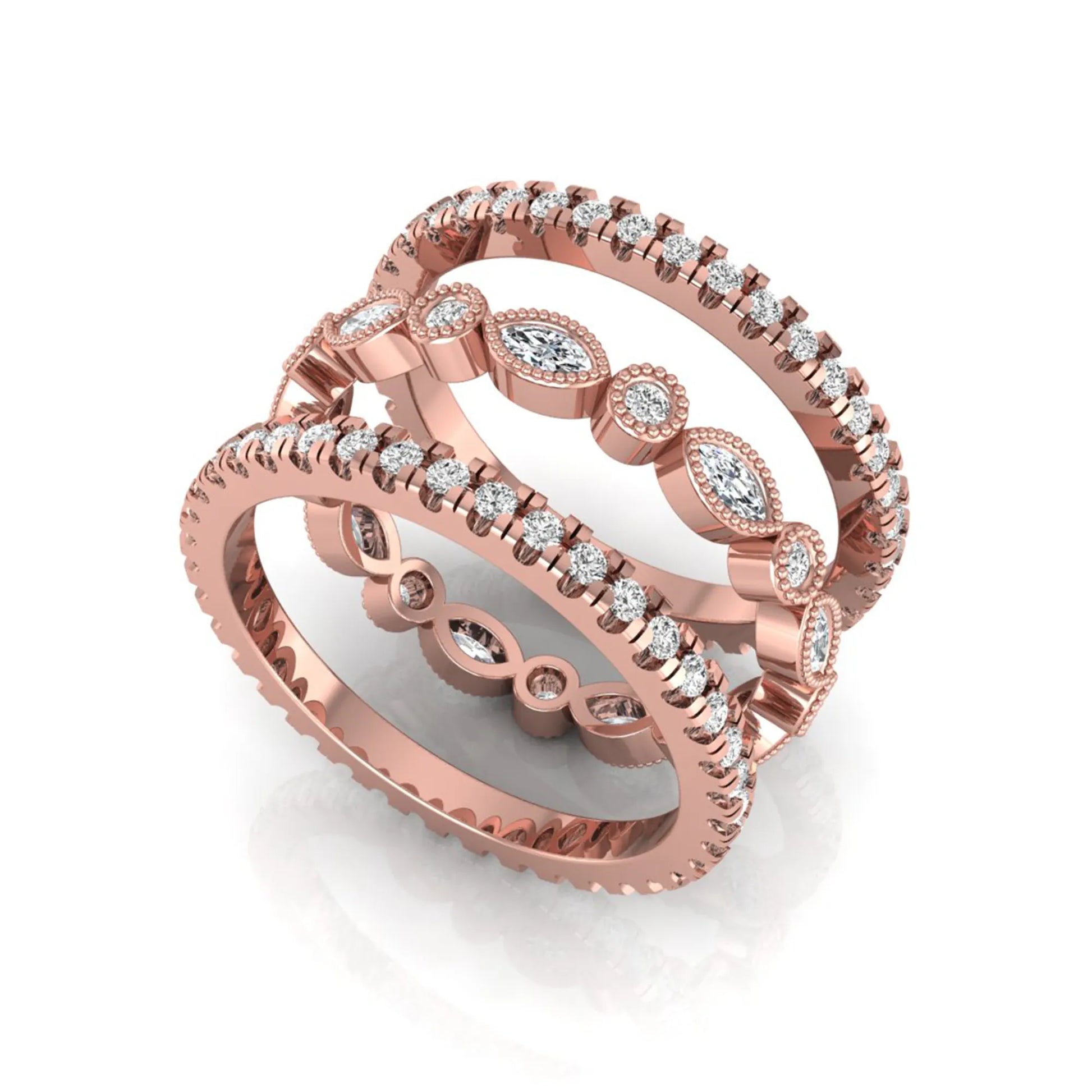 Stackable three band ring set featuring marquise and round lab grown diamonds with vintage milgrain bezels and pavé diamond bands in rose gold
