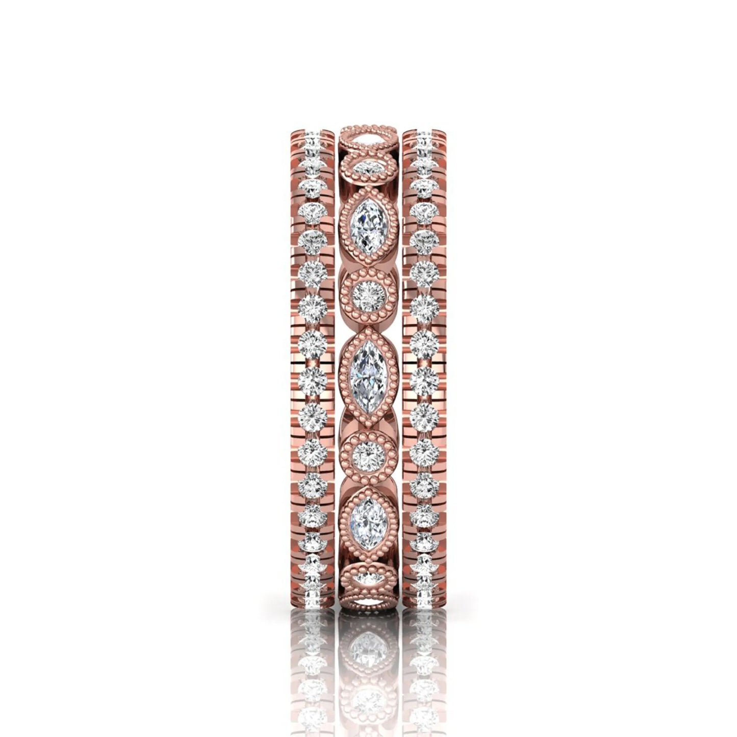Stackable three band ring set featuring marquise and round lab grown diamonds with vintage milgrain bezels and pavé diamond bands in rose gold