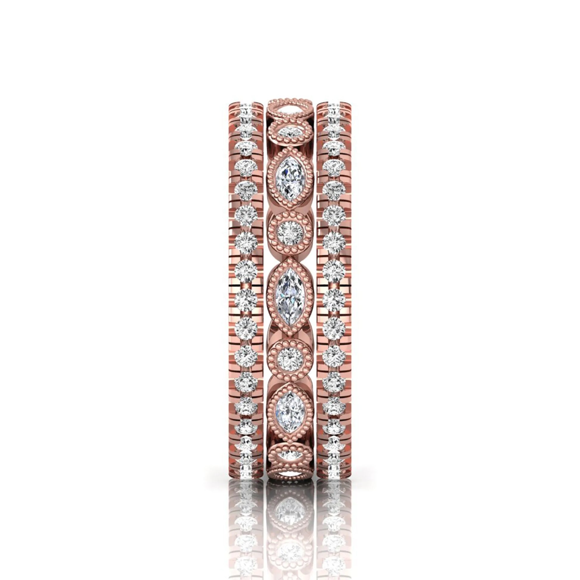 Stackable three band ring set featuring marquise and round lab grown diamonds with vintage milgrain bezels and pavé diamond bands in rose gold