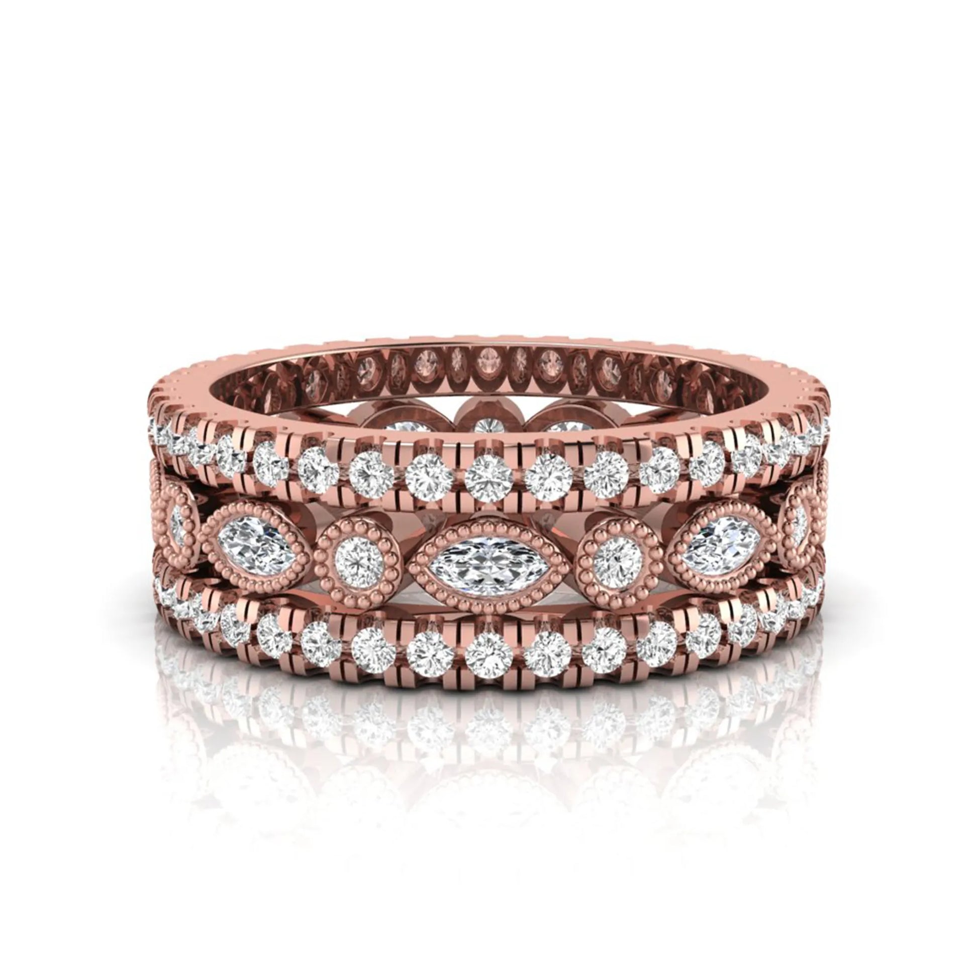 Stackable three band ring set featuring marquise and round lab grown diamonds with vintage milgrain bezels and pavé diamond bands in rose gold