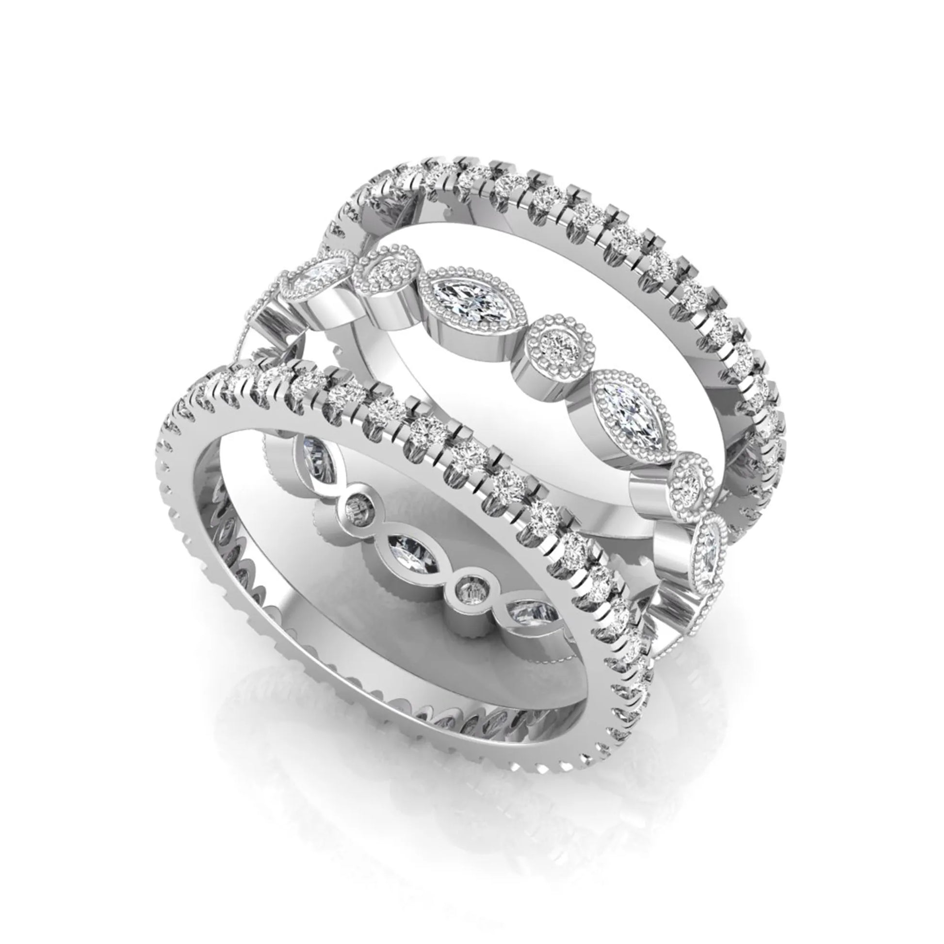 Stackable three band ring set featuring marquise and round lab grown diamonds with vintage milgrain bezels and pavé diamond bands in white gold