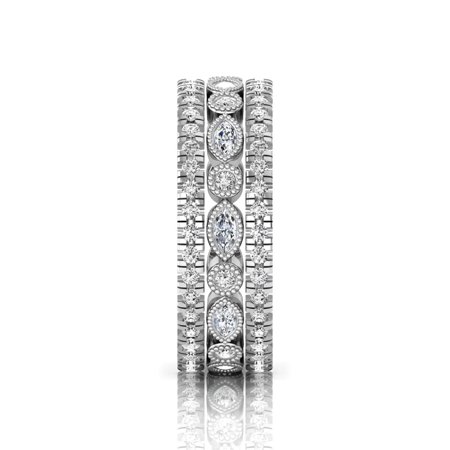 Stackable three band ring set featuring marquise and round lab grown diamonds with vintage milgrain bezels and pavé diamond bands in white gold