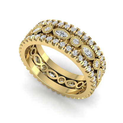 Stackable three band ring set featuring marquise and round lab grown diamonds with vintage milgrain bezels and pavé diamond bands in yellow gold