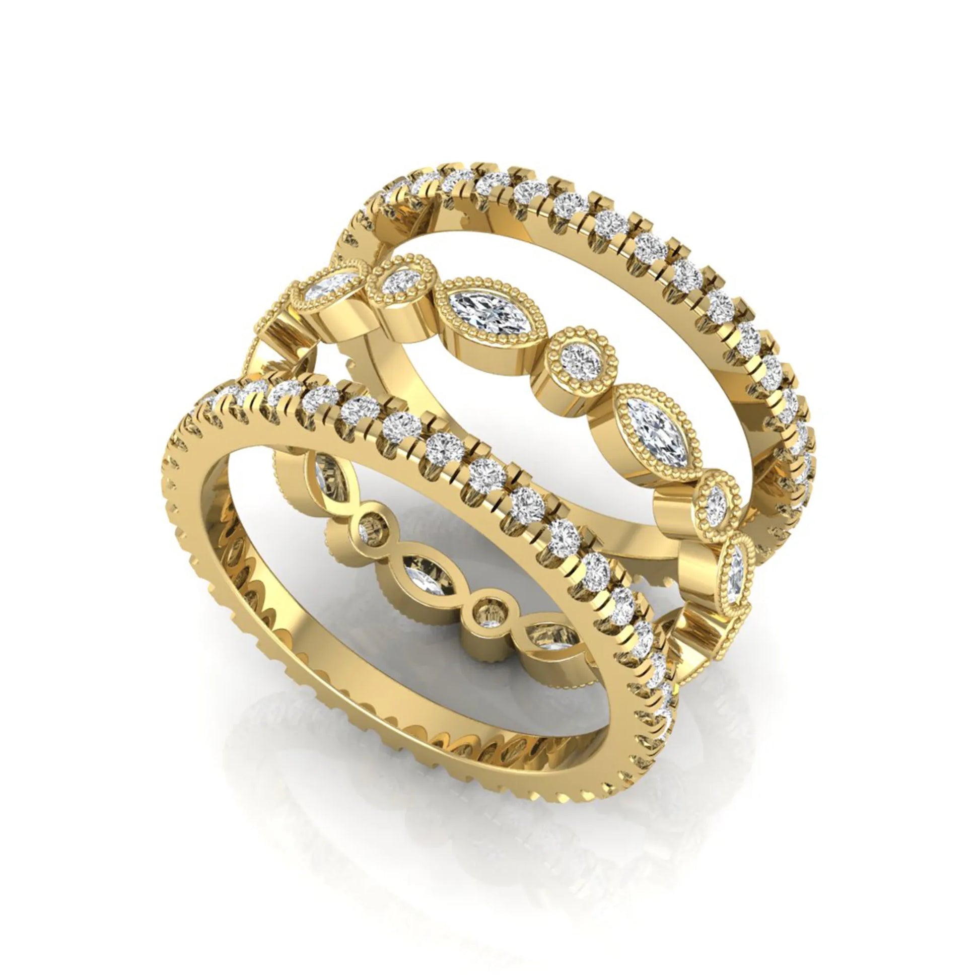 Stackable three band ring set featuring marquise and round lab grown diamonds with vintage milgrain bezels and pavé diamond bands in yellow gold