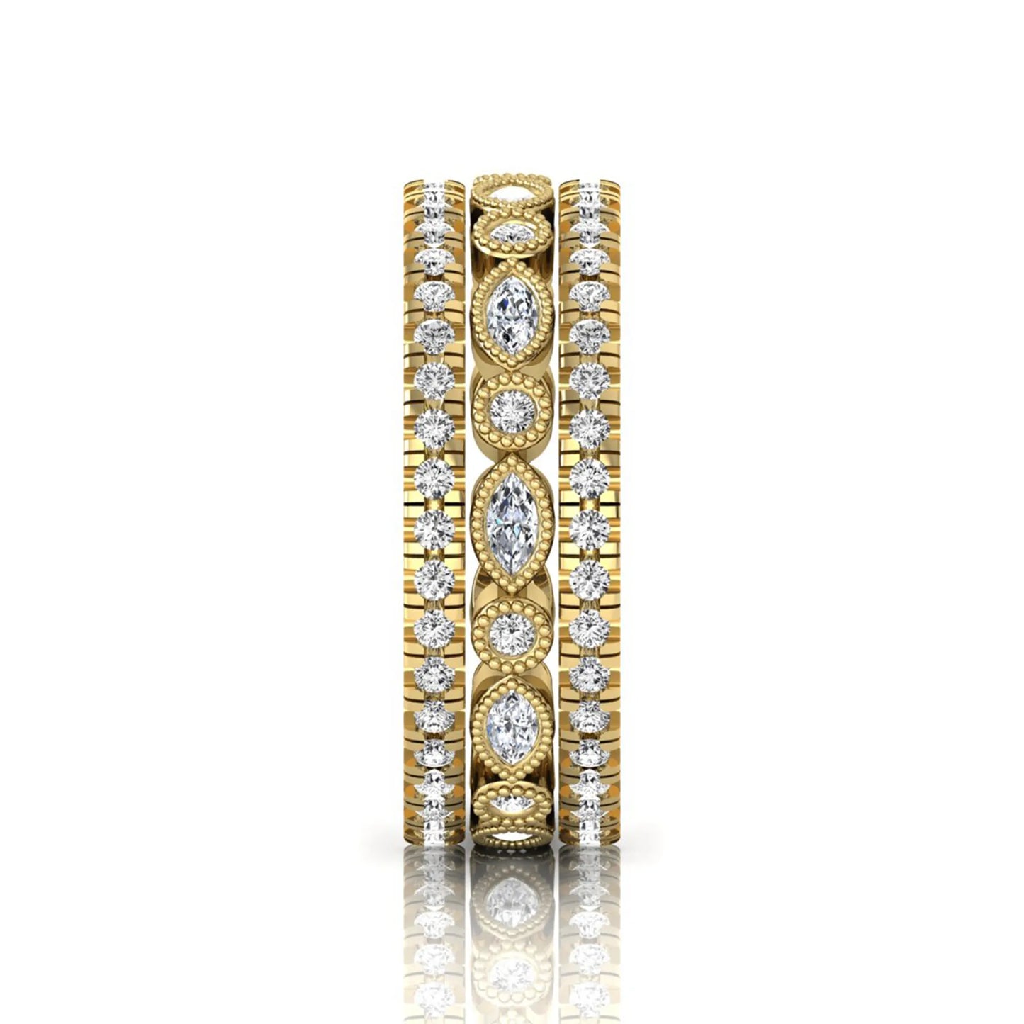 Stackable three band ring set featuring marquise and round lab grown diamonds with vintage milgrain bezels and pavé diamond bands in yellow gold