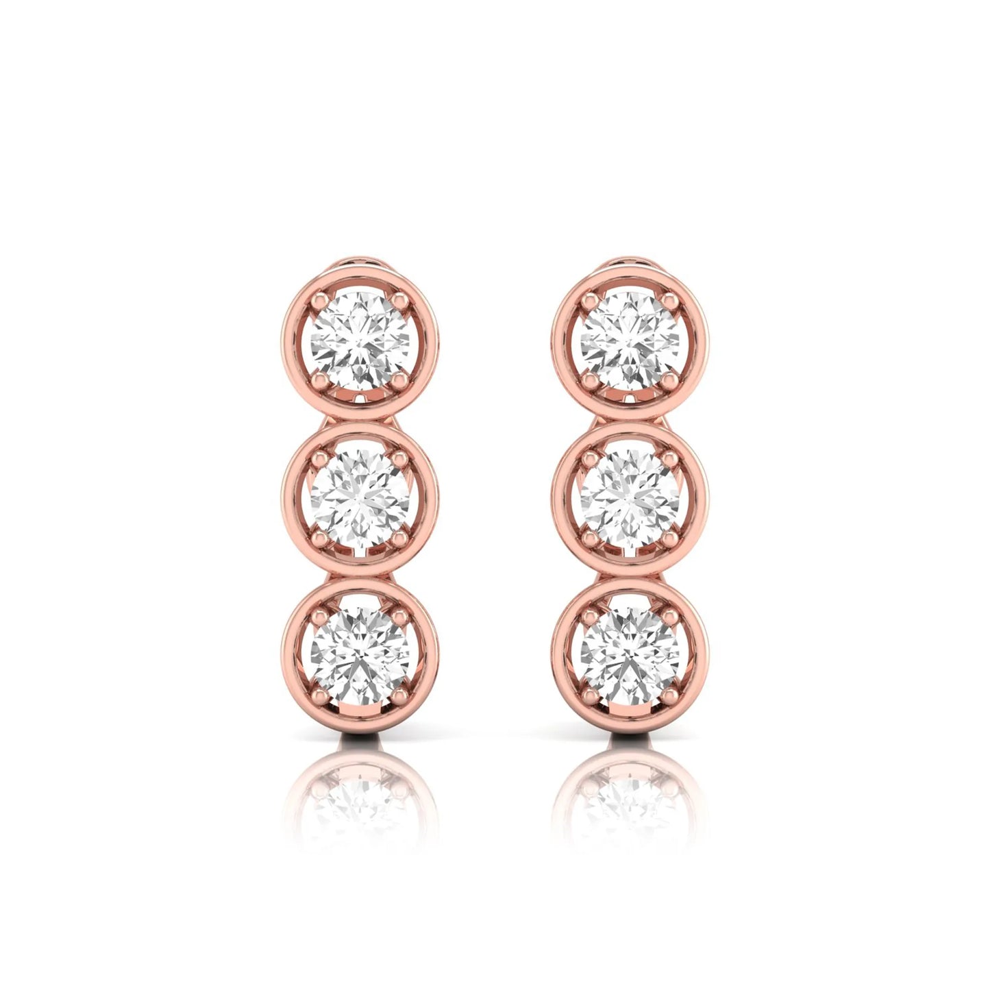 Three stone round cut lab grown diamond hoop earrings featuring bezel-inspired four prong settings, vertical diamond arrangement, hinged snap closure, and rose gold tone.