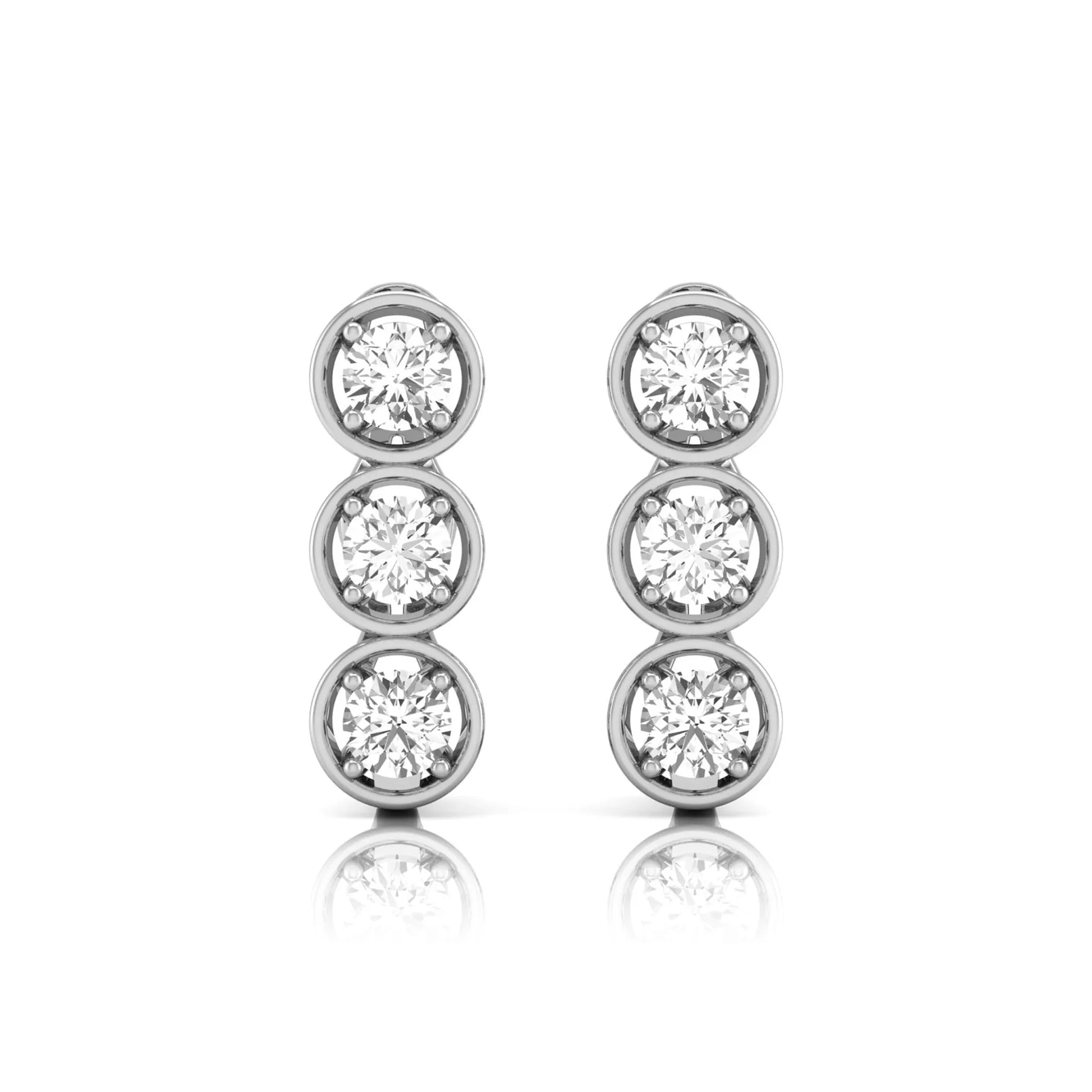 Three stone round cut lab grown diamond hoop earrings featuring bezel-inspired four prong settings, vertical diamond arrangement, hinged snap closure, and white gold tone.