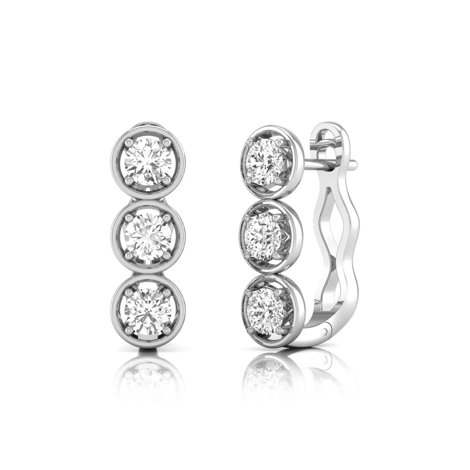Three stone round cut lab grown diamond hoop earrings featuring bezel-inspired four prong settings, vertical diamond arrangement, hinged snap closure, and white gold tone.