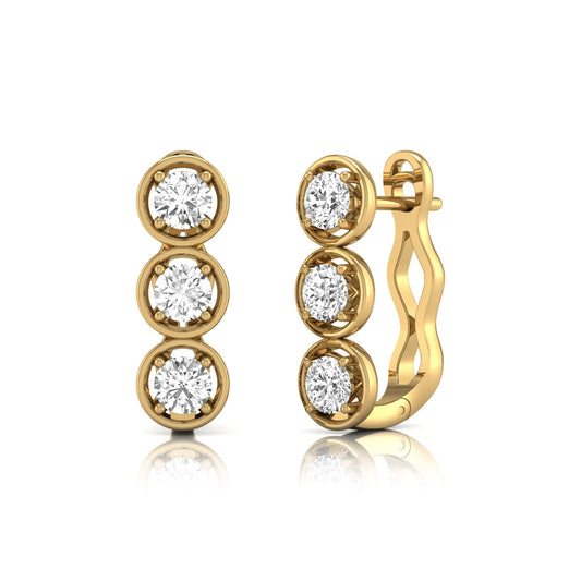 Three stone round cut lab grown diamond hoop earrings featuring bezel-inspired four prong settings, vertical diamond arrangement, hinged snap closure, and yellow gold tone.