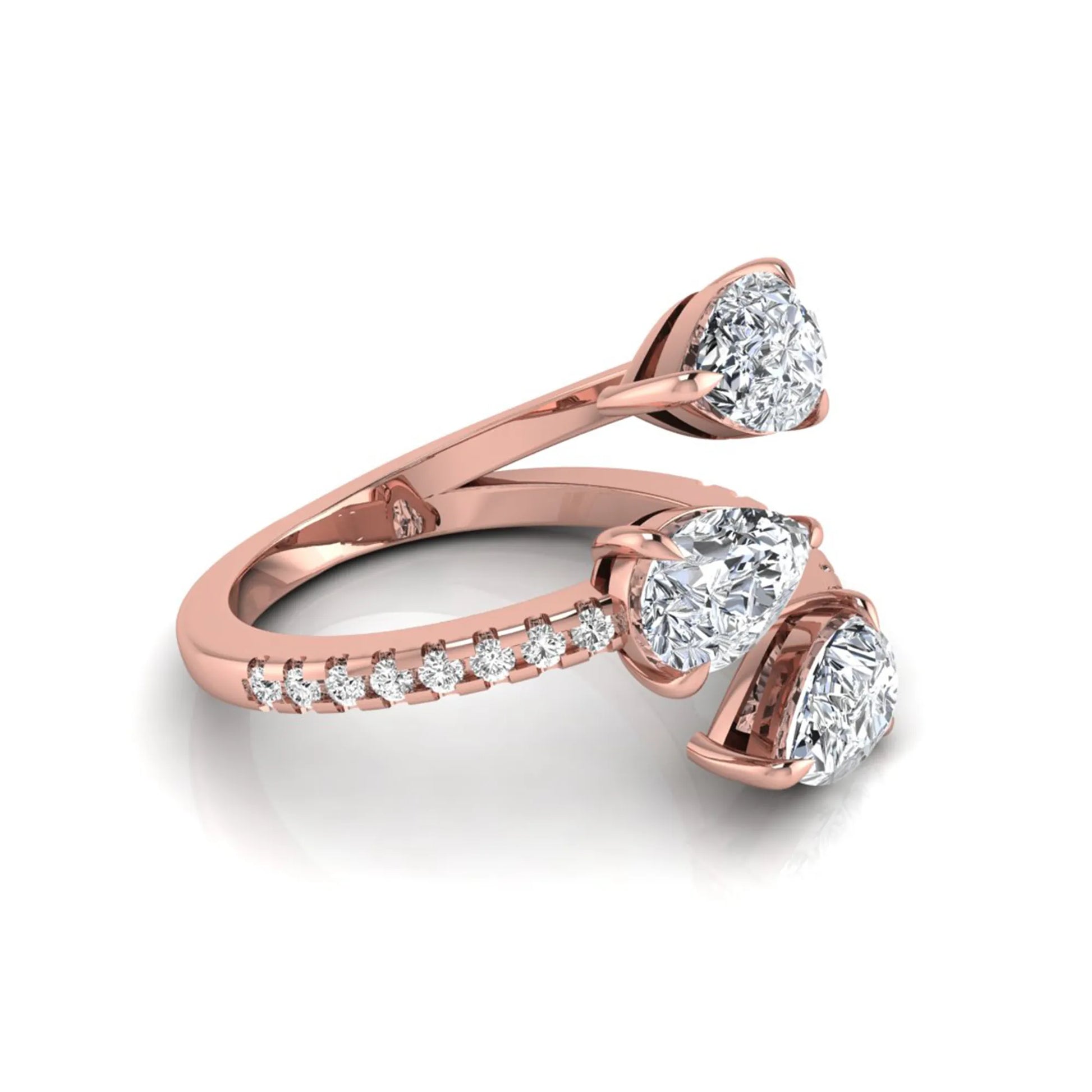 Three stone pear cut lab grown diamond wrap ring featuring round diamond accents and pavé shoulders in polished rose gold.