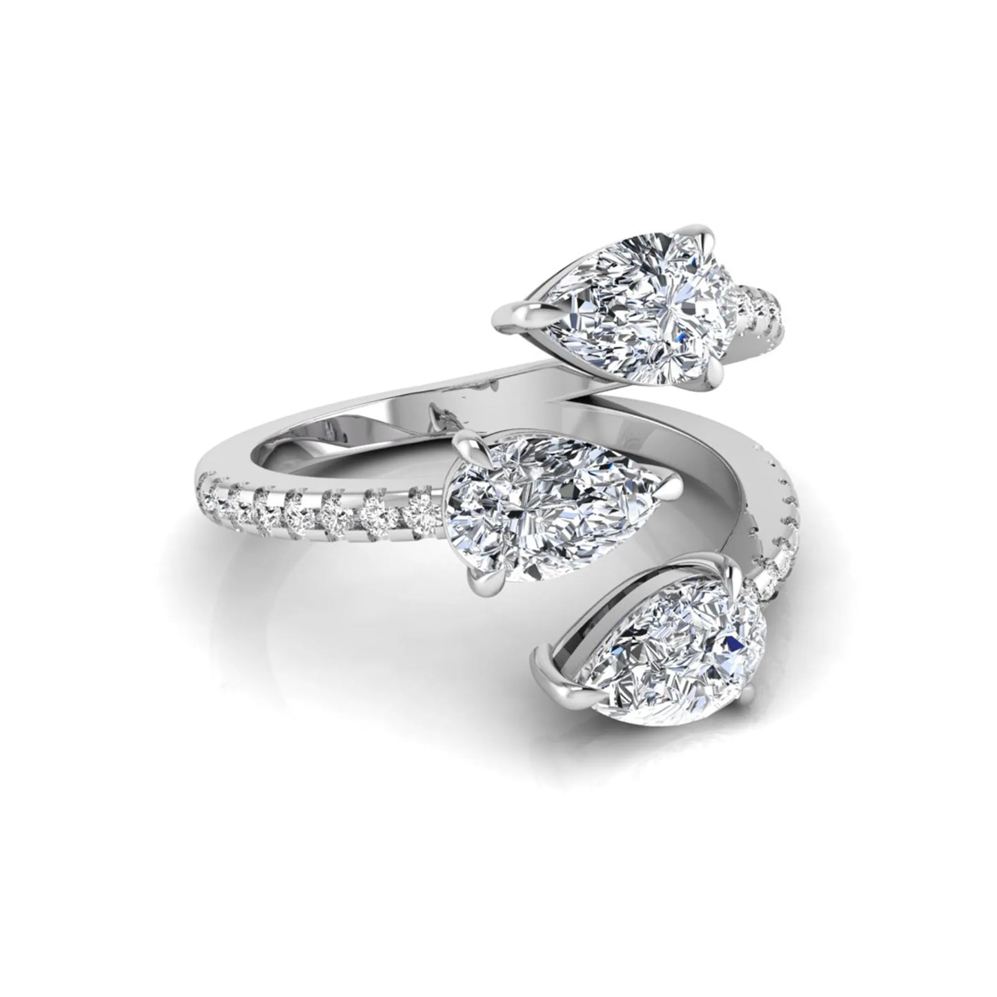 Three stone pear cut lab grown diamond wrap ring featuring round diamond accents and pavé shoulders in polished white gold.