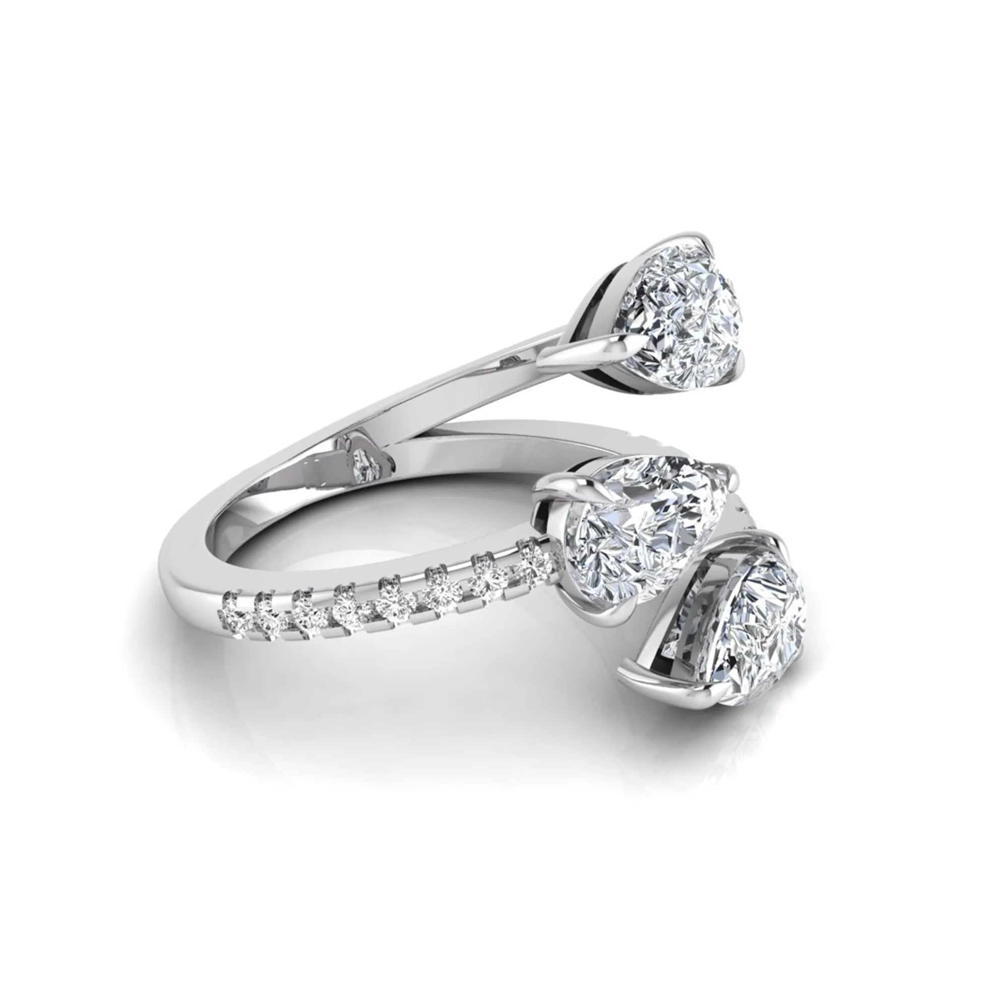 Three stone pear cut lab grown diamond wrap ring featuring round diamond accents and pavé shoulders in polished white gold.