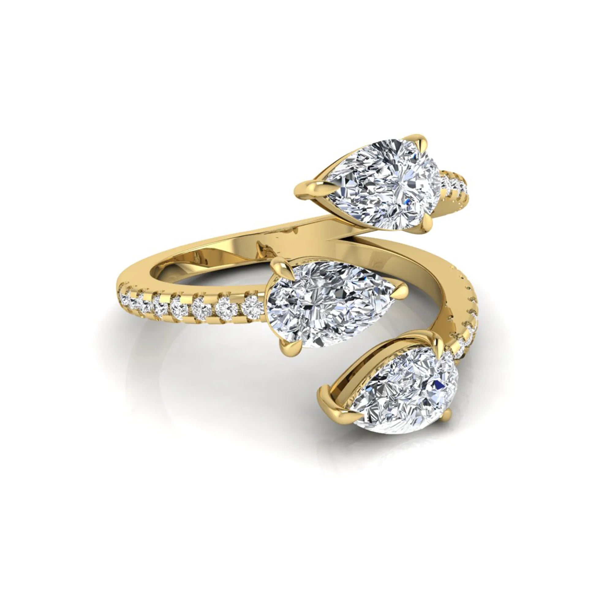 Three stone pear cut lab grown diamond wrap ring featuring round diamond accents and pavé shoulders in polished yellow gold.