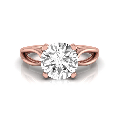 Rose-gold ring with a large diamond on a white background
