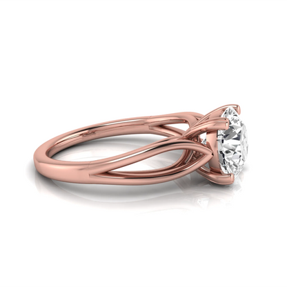 Rose-gold ring with a diamond on a white background