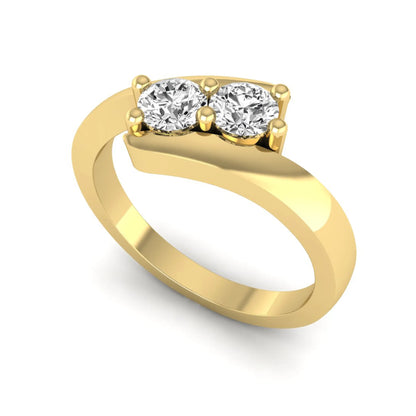 Two stone round cut lab grown diamond bypass ring featuring a graceful crossover yellow gold band
