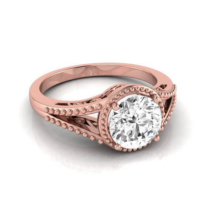 Vintage bezel round lab grown diamond engagement ring featuring a 2.04 carat IGI certified round brilliant diamond with intricate milgrain detailing in rose gold