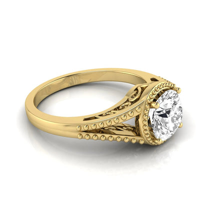 Vintage bezel round lab grown diamond engagement ring featuring a 2.04 carat IGI certified round brilliant diamond with intricate milgrain detailing in yellow gold