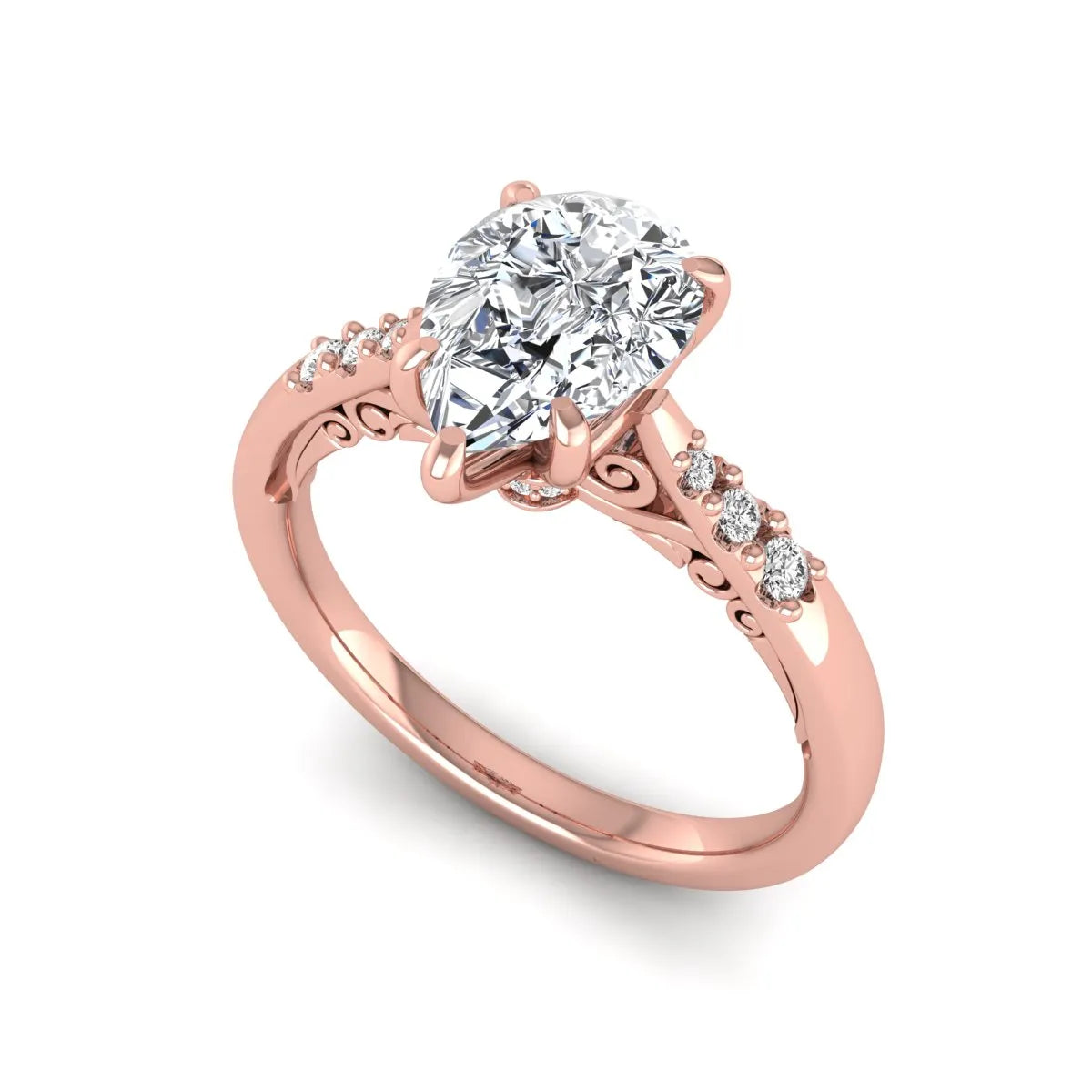 Vintage pear cut lab grown diamond engagement ring featuring an IGI certified center diamond, round diamond accents, and an ornate scroll gallery in rose gold.