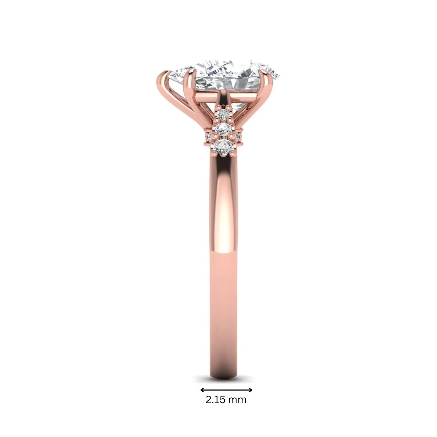 Vintage pear cut lab grown diamond engagement ring featuring an IGI certified center diamond, round diamond accents, and an ornate scroll gallery in rose gold.