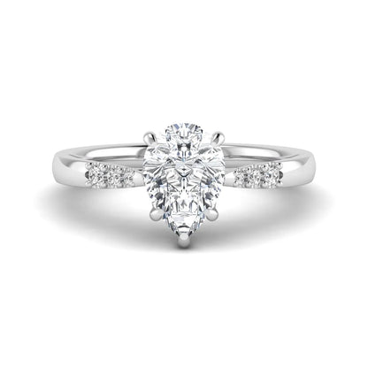 Vintage pear cut lab grown diamond engagement ring featuring an IGI certified center diamond, round diamond accents, and an ornate scroll gallery in white gold.