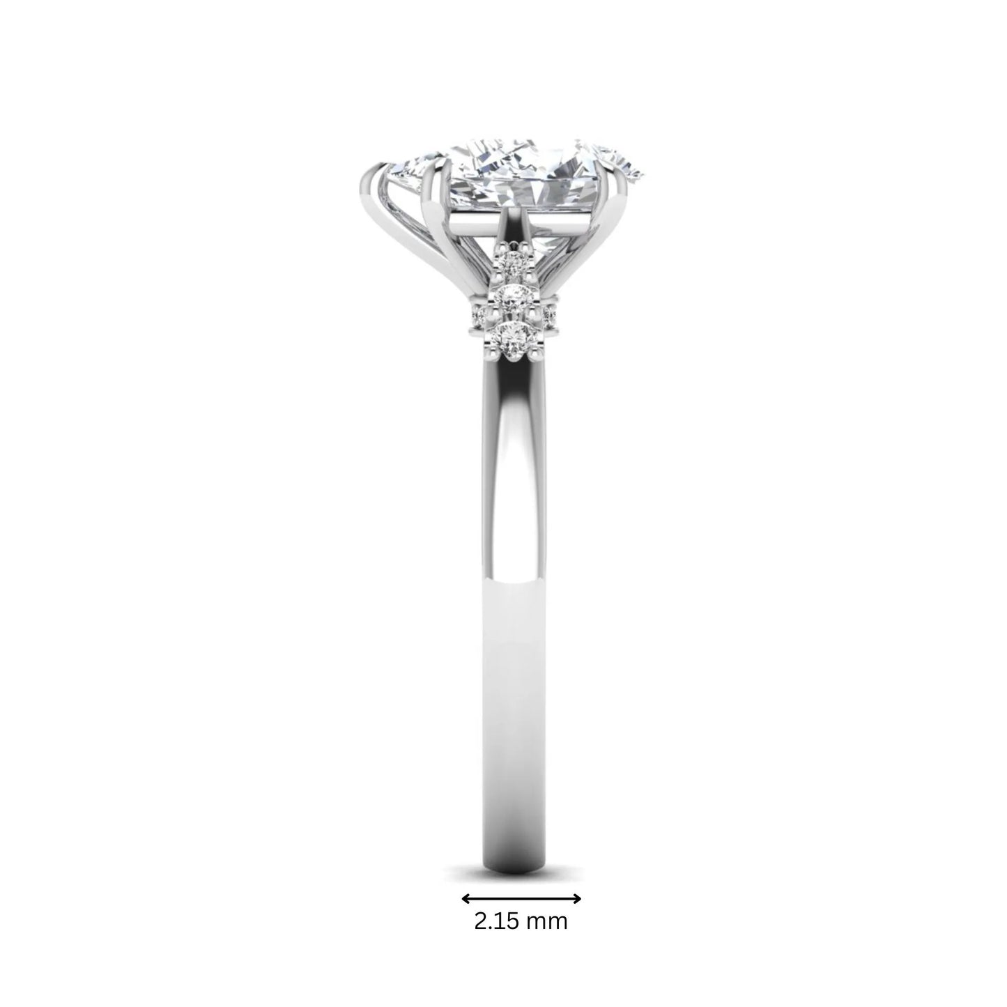 Vintage pear cut lab grown diamond engagement ring featuring an IGI certified center diamond, round diamond accents, and an ornate scroll gallery in white gold.