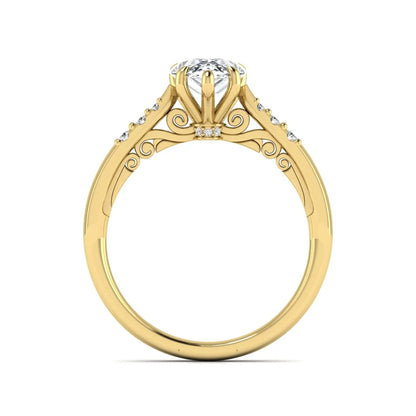 Vintage pear cut lab grown diamond engagement ring featuring an IGI certified center diamond, round diamond accents, and an ornate scroll gallery in yellow gold.
