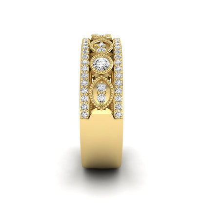 Vintage round lab grown diamond eternity band with milgrain detailing, bezel-set motifs, and pavé diamond edges in yellow gold